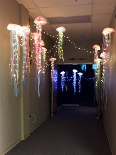 the hallway is decorated with jellyfish lights and streamers