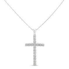 This beautiful piece of jewelry is not only a symbol of devotion and faith but also a true work of art. This gorgeous cross pendant features miracle set promo quality diamonds. The unique miracle-plate setting, which centers each genuine diamond in a mirror-finish, high-polish frame, gives the illusion of much larger stones. This diamond pendant comes with a matching box chain necklace with a spring ring clasp. The contemporary yet classic 18Ã¢â‚¬Â box chain complements any neckline beautifully