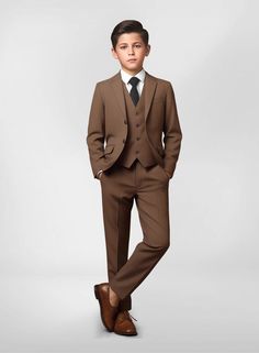 Transform your kid's wardrobe with our Boys' Wool Suit Collection, infusing sophistication and charm into every ensemble. Made from wool, these suits epitomize time-honored gracefulness, perfectly suited for any winter formal occasion.  Each suit is crafted with the same level of care and precision as adult-sized counterparts, ensuring that your little man shines brightly at every party.  Waistcoat not included, has to be added separately using the "Customize Now" button. Kids Coat Pant Boys, Formal Winter Single Breasted Set, Tailored Formal Winter Sets, Formal Winter Suiting Fabric Sets, Classic Business Sets For Winter, Winter Semi-formal Sets In Suiting Fabric, Elegant Brown Three-piece Suit For Winter, Classic Brown Formal Sets, Elegant Brown Three-piece Winter Suit