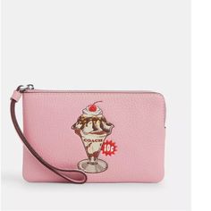 Nwt Coach Corner Zip Wristlet With Sundae Graphic Details Measurements Length: 6.25" Height: 4.0" Width: 0.5" Materials Refined Pebble Leather Fabric Lining Strap Wrist Strap Attached Features Two Credit Card Slots Zip-Top Closure Trendy Coach Clutch With Removable Pouch, Trendy Coach Clutch Wristlet, Madison Brown, Coach Clutch, Pink Wristlet, Coach Logo, Pink Sparkly, Bags Coach, Wristlet Wallet