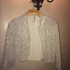 Iisli Sequin Gold Jacket Size 2. Hundred Percent Cotton. Purchased At A Boutique. Like New Never Used. Measures16 Inches In Length Fitted Long Sleeve Holiday Cardigan, Fitted Holiday Cardigan, White Sequined Long Sleeve Outerwear, White Fall Party Cardigan, Formal Winter Outerwear With Sequins, Winter Formal Sequined Outerwear, Winter Outerwear With Sequins, Gold Jacket, Gold Cream