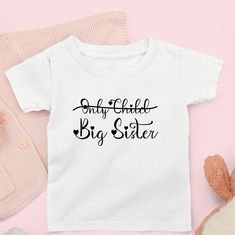 "A gorgeous personalised t-shirt featuring the wording: Only Child Big Sister This t-shirt or baby vest is ideal for a baby announcement or a pregnancy reveal. We made this design so your little one can wear it with pride. A beautiful keepsake and great for photo opportunities - start your own family tradition and create memorable moments. All our products are 100% designed, printed, cut, pressed and shipped to you from our UK studio. They are made to order and can be customised as per your request. *  Made from 100% pure cotton *  Unisex *  Soft and comfortable SIZE GUIDE: T-shirts: 1/2* -24\"   2/3 -25\"    3/4 -26\"   5/6 -28\"    7/8 -30\"    9/11 -32\"    12/13 -34\"     14/15 -36\" Baby bodysuits: 0-3 months - 12lbs 2.7 kg   |   3-6 months 18lbs8kg  |  6-9 months 21lbs 9.5kg   |  9-1 Baby Announcement Big Sister, Big Sister To Be, Sister Announcement, Big Sister Announcement, Big Sister T Shirt, Promoted To Big Sister, Sister Shirt, Sister Tshirts, Big Sister Shirt