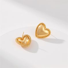 Create a sparkling finish to your look with this pair of heart-shaped stud earrings. 0.91" W x 0.91" L 18k gold-plated copper Valentine's Day Tarnish-resistant Heart Drop Earrings, Valentine's Day Gold Plated Open Heart Earrings, Valentine's Day Gold Plated Heart Earrings, Valentine's Day Rose Gold Heart Earrings, Tarnish Resistant Heart Earrings For Valentine's Day, Gold Plated Heart Pendant Earrings For Valentine's Day, Gold Double Heart Earrings For Mother's Day, Gold Heart Earrings For Mother's Day, Gold Heart Charm Earrings For Mother's Day