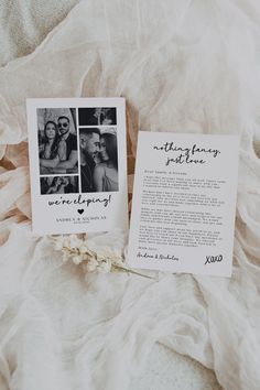 a couple's wedding vows and an anniversary card on top of a white blanket