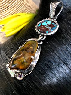 "Artisan Turquoise with Baltic Amber pendant Hand-made Sterling Silver 925 Stones used: Prince Turquoise, Baltic Amber, Amethyst Height - 3 1/4\" (with bail), Width - 1\" Height -85mm (with bail), Width - 26mm Unique Handcrafted One-of a-kind Design Pendant Each Piece of Jewelry in my Collection is Absolutely One of a Kind! When you start wearing a piece of my jewelry you will fall in love with it more and more each day and feel that good Energy and Love that I pass into it while creating this p Artisan Turquoise Jewelry For Anniversary, Unique Sterling Silver Cabochon Turquoise Necklace, Unique Turquoise Jewelry For Anniversary, Artisan Turquoise Necklace With Natural Stones, Handmade Artisan Turquoise Jewelry, Unique Turquoise Cabochon Pendant Necklace, Unique Turquoise Oval Pendant Jewelry, Unique Collectible Turquoise Necklace, Artisan Handmade Turquoise Jewelry