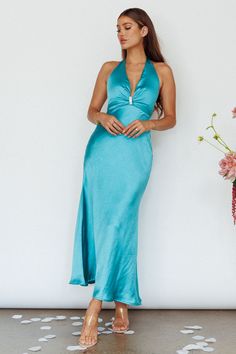 Turquoise maxi dress Halterneck Partially lined Diamante decoration in bust Zipper in back You will turn heads in our stunning Oasis maxi dress. Featuring a diamante decoration in the bust and flattering halterneck style. It's perfect for a wedding or birthday soiree. Team it with silver heels and a clutch for an unforgettable look. MODEL INFO Model is wearing size XS Height: 5'7" Bust: 34" Waist: 24" Hips: 34" SIZE INFO Flat garment measurements This was manually measured from the actual garmen Birthday Soiree, Turquoise Maxi Dress, Oasis Dress, Iron Material, Clothing Tags, Silver Heels, Blue Jacket, Hip Length, A Wedding