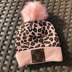 Leopard Print Pink Beanie with Pom Pom DISCLAIMER-- We do NOT sell licensed Louis Vuitton products. This is an upcycled item made from new products and used LV bags. We legally purchase items from wholesale vendors who use previously loved items to create our upcycled products. Southern Diva Designs is in NO WAY associated or affiliated with Louis Vuitton and/or their subsidiaries. Upcycled Products, Leopard Print Pink, Beanie With Pom Pom, Pink Beanie, Beanie With Pom, Wholesale Vendors, Diva Design, Pink Beanies, Wholesale Accessories