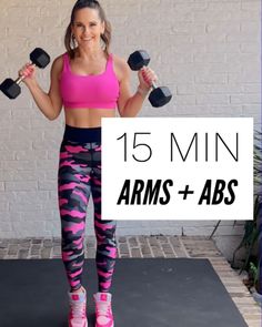 a woman in pink top and black leggings holding two dumbbells with the words 15 min arms + abs