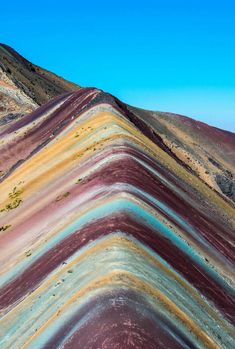 the colors of the rainbow mountain range are very vibrant and colorful in this photo, there is no image here to provide a caption