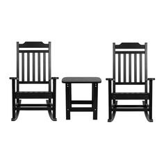 two black chairs and a table on a white background