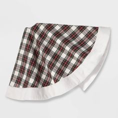 a black and white plaid bandana with red trim on the bottom, in front of a gray background