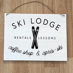 ski lodge rentals lessons sign hanging on the wall