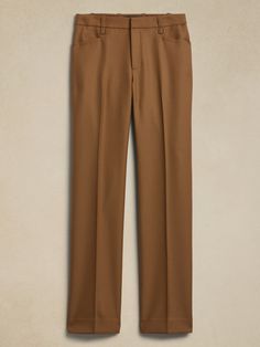 Sharp and smart, this extra long pant is cut to wear with your favorite heels.  A high waist and straight leg adds length to every step.  ITALIAN WOOL: Soft and smooth, this wool fabric from Italy's Marzotto mill is perfect for cooler weather.  Zip f Tailored Wool Straight Bottoms, Tailored Wool High-waisted Pants, Tailored Wool Straight Pants, Tailored High-waisted Wool Pants, Tailored Wool Wide Leg Pants, Wool Straight Leg Pants For Business Casual, Wool Straight Pants For Business Casual, Wool Straight Leg Business Casual Pants, Wool Wide Leg Pants For Business Casual