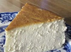 a piece of cheesecake on a blue and white plate