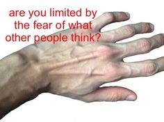 a person's hand with the words are you limited by the fear of what other people think?