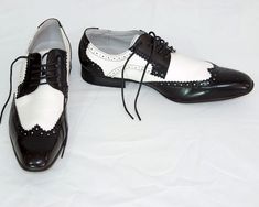 Classic  men's  leather black & white shoes,Swing leather shoes wedding vintage style oxford ties shoes marked size 42 excellent condition  pre-owned  by Galax. Paris materials upper- faux leather lining - real leather out sole - rubber , synthetic  Measurements :  11" (27 cm) insole length width 9 cm (3,5" ) Weight  0,74 kg - 1,63 Lbs Returns & exchanges  If there is a problem with your order, please contact me before leaving negative feedback so we can resolve the issue SHIPPING Sending the order is carried out within 1-2 days except weekends. Orders are sent by AIRMAIL . Ships with tracking number. After the shipment I will provide you the tracking number to your package, so you can see where it is and when you will receive it. White Oxford Shoes, Ties Shoes, Black White Shoes, Oxford White, Black And White Shoes, Wedding Vintage, Shoes Wedding, Mens Oxfords, Tie Shoes