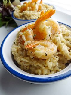 shrimp and rice with carrots in a bowl