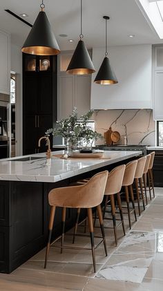 a kitchen with marble counter tops and wooden chairs next to an island in the middle