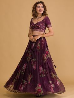 Introducing the stunning wine floral digital organza festival wear lehenga choli from Ethnic Plus! This exquisite ensemble is crafted with precision and attention to detail, making it the perfect choice for weddings and festive occasions like mehendi ceremonies. Let's delve into the benefits and key features of this gorgeous outfit.
The wine color of this lehenga choli exudes sophistication and adds a touch of glamour to your look. It is a timeless and elegant choice for any special event.This s Eid Party Lehenga With Floral Print, Floral Print Choli For Eid Party, Purple Floral Embroidered Sharara For Wedding, Purple Anarkali Lehenga With Floral Embroidery, Festive Organza Lehenga With Floral Print, Floral Print Semi-stitched Lehenga In Organza, Bollywood Style Floral Print Organza Choli, Navratri Floral Print Organza Lehenga, Purple Floral Embroidered Lehenga For Eid