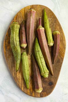 the vegetables are cut up and ready to be eaten on the cutting board for consumption