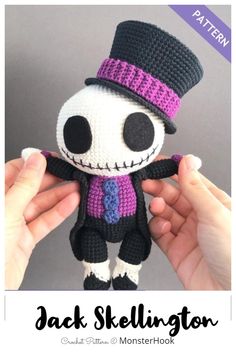 someone is holding up a crocheted jack skellingy doll with a top hat