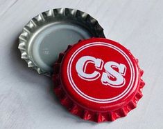 a bottle cap with the css logo on it