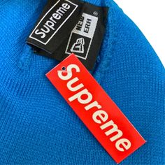 Elevate your streetwear game with our blue World Famous New Era Supreme beanie. Crafted from premium materials, this iconic beanie boasts a vibrant blue hue, featuring the renowned "World Famous" logo in striking contrast. It offers both style and comfort, making it a must-have accessory for any fashion-forward enthusiast. Stay cozy and on-trend with this limited-edition Supreme beanie. Fabric: 100% cotton One size fit all. Blue Hat With Logo Patch For Streetwear, Blue Streetwear Hat With Logo Patch, Streetwear Beanie With Logo Patch, Blue Casual Beanie For Streetwear, Casual Beanie With Embroidered Logo For Streetwear, Casual Streetwear Beanie With Embroidered Logo, Supreme Beanie, Blue World, Famous Logos