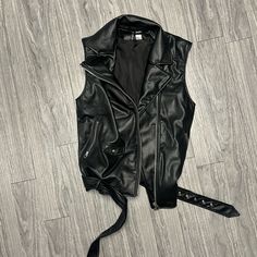 H&M Faux Leather Motorcycle Vest Size Small Never Worn Leather Biker Outerwear For Night Out, Trendy H&m Outerwear For Streetwear, Biker Faux Leather Jacket For Night Out, Biker Style Faux Leather Jacket For Night Out, Faux Leather Biker Outerwear For Night Out, Punk Leather Outerwear For Night Out, Trendy Black H&m Outerwear, Trendy Black Outerwear By H&m, Biker Style Leather Vest