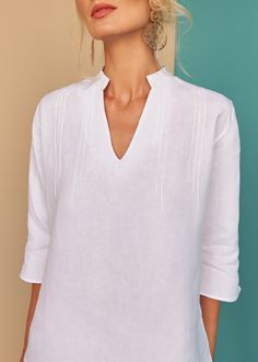 This Nyda tunic with textured pin-tuck details works a dream over your swim suit for lunch style with our Laura shorts or skin tight jeans for a beach side stroll. - 100% Italian "Masters of Linen"Pre-shrunkSoftened White Italian, Beach Side, Asymmetric Dress, Linen Tunic, Clothing Manufacturer, Linen Top, Pin Tucks, Swim Suit, Asymmetrical Dress