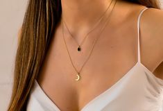 This layered moon and Onyx necklace is a set of 2. The chains are gold plated sterling silver 925. They have an extension so that the size can be adjusted. The one necklace has a natural teardrop stone pendant. The second necklace has a moon pendant. The stones are natural stones and no 2 are identical, but they are similar. If you would like a custom order or have any questions please contact me, thanks.