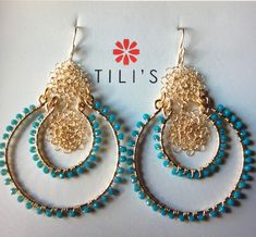 Each pair of these artisan earrings are made by hand, making every set unique.  This set features loop earrings with aquamarine czech glass crystals.  The center contains peruvian style wire wrap.  They are both elegant and modern.  Personalized, high-quality jewelry, always beautiful and classy.  You make the difference with Tili's! Artisan Multicolor Handmade Hoop Earrings, Turquoise Wire Wrapped Czech Glass Earrings, Artisan Multicolor Hand-strung Beaded Earrings, Peruvian Style, Bohemian Multicolor Beaded Clip-on Earrings, Artisan Hand-strung Multicolor Beads, Turquoise Bohemian 14k Gold-filled Earrings, Hand Making, Loop Earrings