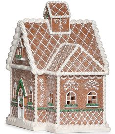 a gingerbread house is shown on a white background