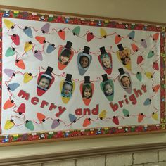 a bulletin board with pictures of children's faces and hearts on it in front of a fireplace