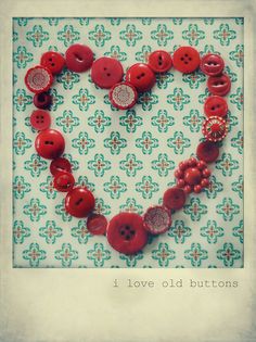 a heart made out of red buttons with the words i love old buttons on it