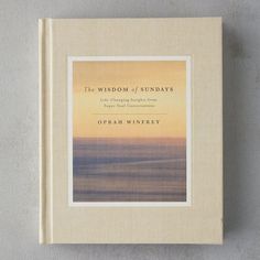 a book with an image of the ocean and sky in it's front cover