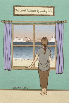 a woman standing in front of a window looking out at the ocean