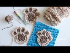 crocheted items are displayed on a table