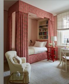 a bedroom with pink walls and curtains on the windowsills is furnished with white furniture