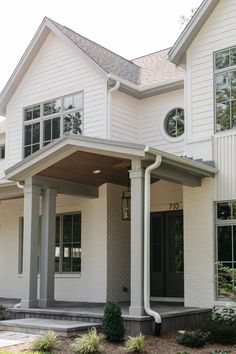 a large white house with columns and windows