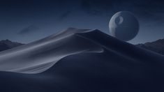 an image of the moon in the night sky over a desert landscape with sand dunes and mountains