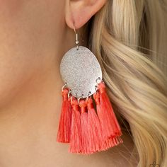 A fringe of shiny coral threaded tassels swing from the bottom of a warped silver disc brushed in an incandescent metallic shimmer for a whimsical flair. Earring attaches to a standard fishhook fitting.

Sold as one pair of earrings. Silver Dangle Tassel Earrings, Silver Dangle Tassel Earrings With Fringe, Adjustable Silver Tassel Earrings For Party, Silver Tassel Earrings With Latkans For Party, Paparazzi Accessories, Affordable Jewelry, Boss Babe, Fish Hook, Crochet Earrings