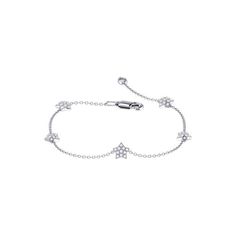 Live your glamour moment with the Starkissed Bracelet. Crafted in 925 Sterling Silver, this bracelet features 100% natural, genuine diamonds. 0.16 carats of diamonds are used in a micro pave setting. The bracelet is 7" long, but is also offered in Small, Medium & Large sizes.The big star collet is 6.6mm in length and 5.8mm in width, while the small star collet is 5.9mm in length and 5.2mm in width.This bracelet is beautifully presented with the inspirational poem 'Dreamer' written by the LMJ Luxury Sterling Silver Star-shaped Jewelry, Adjustable Silver Star Bracelet, Adjustable Sterling Silver Star Bracelet, Luxury Timeless Sterling Silver Diamond-cut Bracelet, Nickel-free Silver Star Bracelet, Silver Diamond Bracelet, Micro Pave, Yellow Diamond, Silver Diamonds