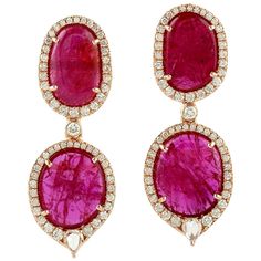 Handcrafted from 18-karat gold, these stunning earrings are set with 11.13 carats of rubies and 1.13 carats of glimmering diamonds. FOLLOW MEGHNA JEWELS storefront to view the latest collection & exclusive pieces. Meghna Jewels is proudly rated as a Top Seller on 1stDibs with 5 star customer reviews. All items manufactured by us are handmade and can be customized or redesigned. Composition Size-37X14 MM Total Weight-9.81 Gold Weight(Gms)-7.358 Diamond Wt(Cts)-1.13 Ruby Wt(Cts)-11.13 Luxury Diamond Earrings With Prong Setting, Luxury Ruby Earrings With Prong Setting, Luxury Red Diamond Earrings, Luxury Ruby Gemstone Earrings, Kelly Rutherford, Pink Sapphire Earrings, Bling Earrings, Jeweled Earrings, Swarovski Crystal Necklace