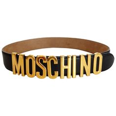 Moschino Letter Logo belt! "MOSCHINO” letters cast in brilliant gold metal. "M” and "O” are bolted down, the rest of the letters slide along the belt. Soft black italian leather belt. Three punched holes with double hook closure. Marked: 38 Total Length: 31” Fits: 25” 26” 27” Logo Letter, Moschino Logo, Letter Logo, Soft Black, Double Crochet, Italian Leather, Moschino, Leather Belt, Metallica