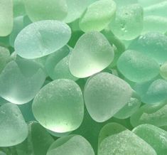 green and white sea glass is shown in close up