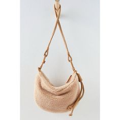 Nwot Color Is Tan This Color Is No Longer Available Online Style No. 85646552; Color Code: 045 More Than Just Your Basic Bag, This Slouchy Sling Is Featured In A Soft Sherpa Fabrication And Unstructured Silhouette With Single Shoulder Strap And Top-Zip Closure. Features: Soft Faux Sherpa, Vegan Leather Trim, Fixed Shoulder Strap, Top-Zip Closure, Lined Interior With Slip Pockets. Anthropologie Casual Beige Shoulder Bag For Winter, Casual Winter Beige Shoulder Bag, Casual Winter Hobo Bag For Travel, Casual Winter Hobo Bag For Everyday Use, Casual Winter Hobo Bag, Winter Beige Crossbody Shoulder Bag, Fall Beige Hobo Bag, Casual Beige Hobo Bag For Fall, Casual Camel Bags For Fall