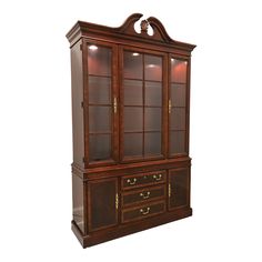 a wooden china cabinet with glass doors and drawers on the bottom, in an antique style