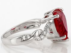 Pre-Owned 7.64ct heart shape lab created ruby with .23ctw round white topaz sterling silver ring. Measures approximately 1/2"L x 1/16"W. Not sizeable. Rhodium plated..  This product may be a customer return, vendor sample, or on-air display and is not in its originally manufactured condition.  It may not be new.  In some instances, these items are repackaged by JTV. Anniversary Lab-created Ruby Cushion Cut Jewelry, Valentine's Day Ruby Ring With Accent Stones, Red Heart Cut Diamond Accented Jewelry, Silver Ruby Ring For Valentine's Day, Red Heart Cut Diamond Accent Jewelry, Red Heart Cut Jewelry With Diamond Accents, Red Heart Cut Jewelry With Accent Stones, Lab-created Ruby Promise Ring With Diamond Accents, Elegant Jewelry With Heart Cut Lab-created Ruby