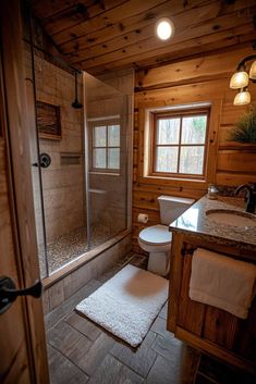 a bathroom with wood walls and tile flooring