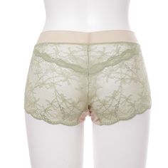 All-lace shorts that tickle the feminine spirit, luxuriously using leavers lace with leaf and flower motifs. The lacy shorts that match the bra are light and comfortable because the maxi-length lace covers the entire hips and the waist is made of tulle. The leavers lace pattern has a somewhat nostalgic feel, with flowing circles of leaves and small flowers.  Filiscotzia cotton thread is used in areas that come into contact with the skin. Filoscozia is a brand of cotton yarn that is known for having the highest quality in the world. It is made using only rare extra-long staple cotton. We carefully knit the thread in-house. Made in Japan Hand wash Wash with like colours. Do not tumble dry. Keep a steam iron floating when using Beige Lace Brief Bottoms, Lace Brief Bottoms With Contrast Lace, Beige Lace Bottoms With Delicate Details, Green Lace Stretch Bottoms, Green Stretch Lace Bottoms, Sheer Lace Brief Bottoms, Sheer Lace Briefs, Wolf And Badger, Flower Motifs